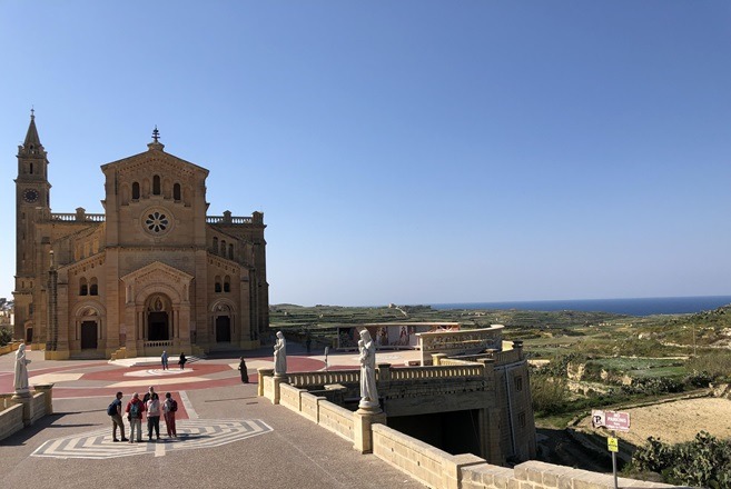 View of the front of Ta'Pinu Basilica and the landscape around it