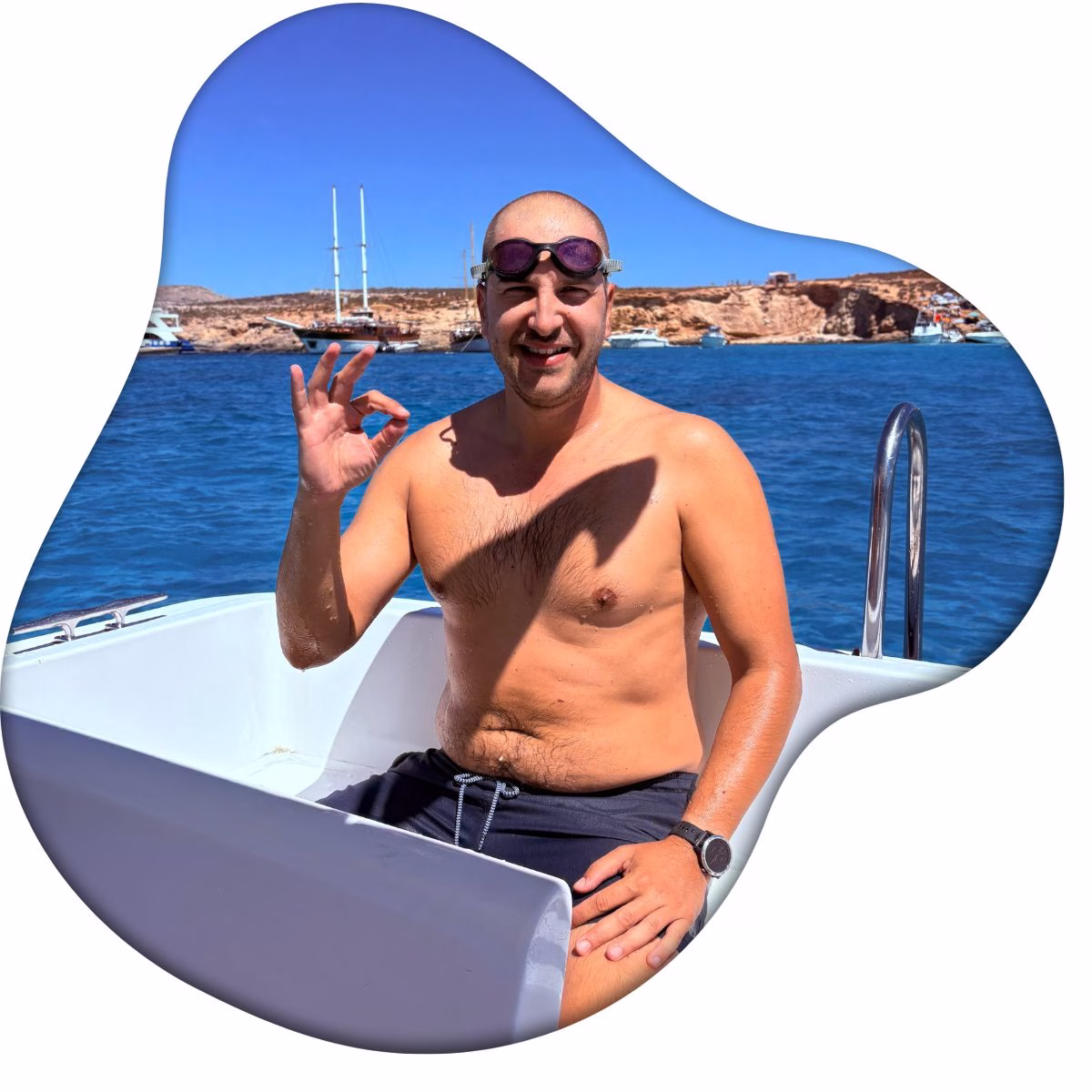 boat with a water slide on a shared boat trip at blue lagoon